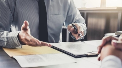 Attorney speaking with client